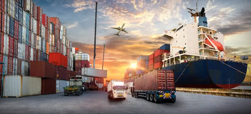 Global logistics hub for heavy machinery export, featuring container ships and air freight services to Casablanca and international ports.