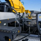 MOBA Big Sonic-Ski leveling system mounted on an asphalt paver