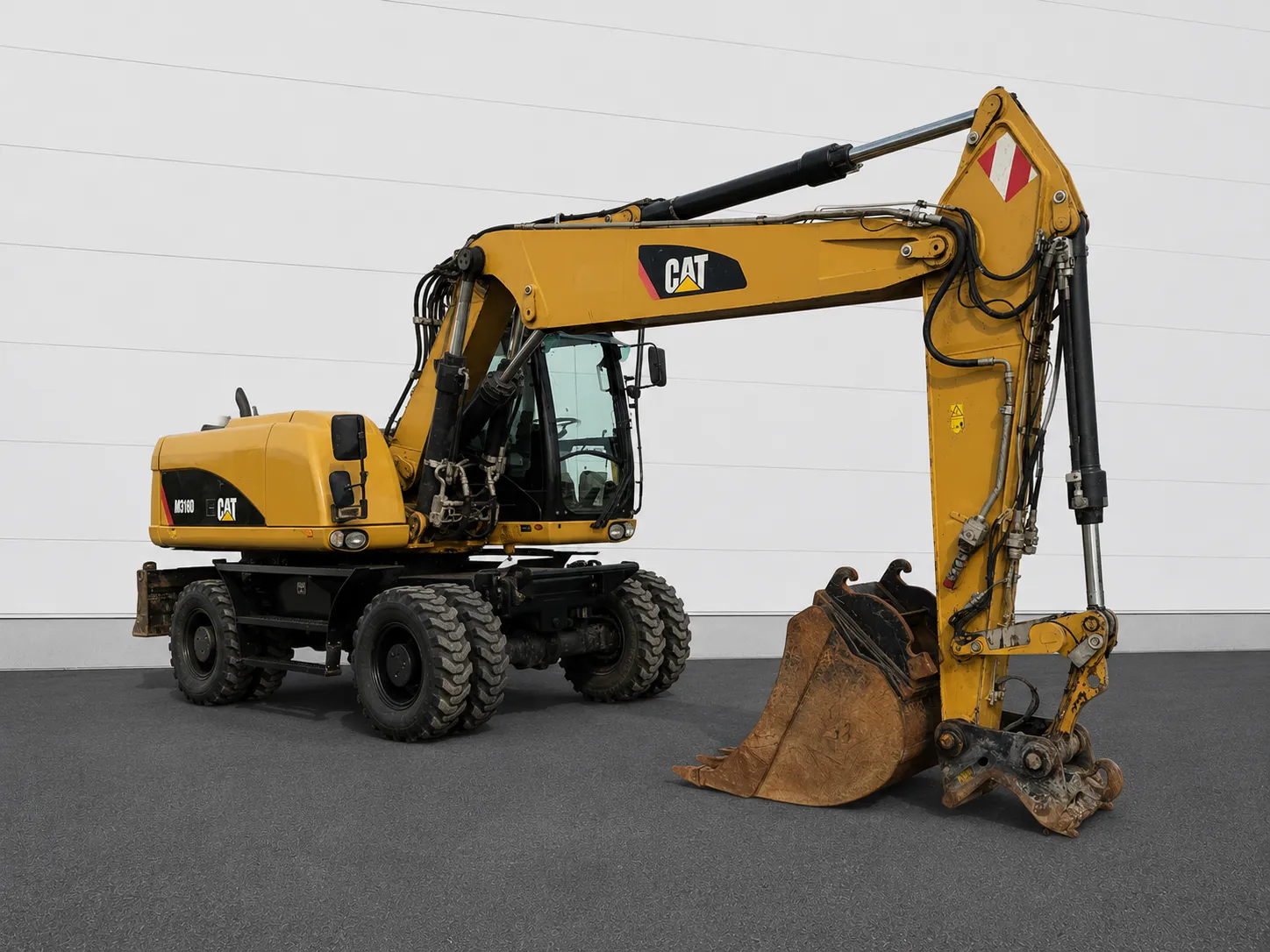 Caterpillar M318D Wheeled Excavator 2014 12150 h Caterpillar M318D wheeled excavator 2014 with 12150 operating hours