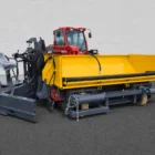 Road widening paver mounted to a red Manitou tractor with operator seat and hydraulic hoses