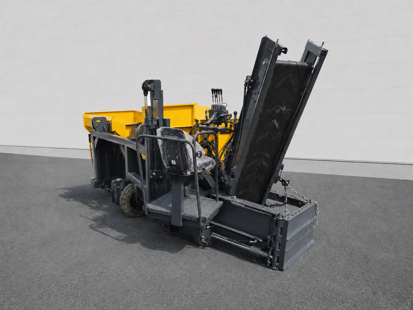 Road widening paver rear three-quarter view with raised side panel