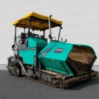 Voegele Super 1800-1 tracked asphalt paver front three-quarter view with material hopper