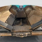 Voegele Super 1800-1 asphalt paver close-up of the material hopper interior and conveyor