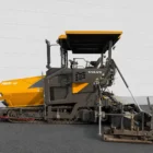 Volvo ABG P 8820 C asphalt paver full side view with hopper, crawler track and screed