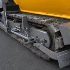 Volvo ABG P 8820 C asphalt paver close-up of the crawler track and drive assembly
