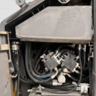 Volvo ABG P 8820 C asphalt paver close-up of the hydraulic pump compartment and hoses