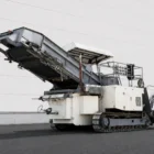 Voegele MT 1000-1 asphalt feeder rear three-quarter view with raised conveyor
