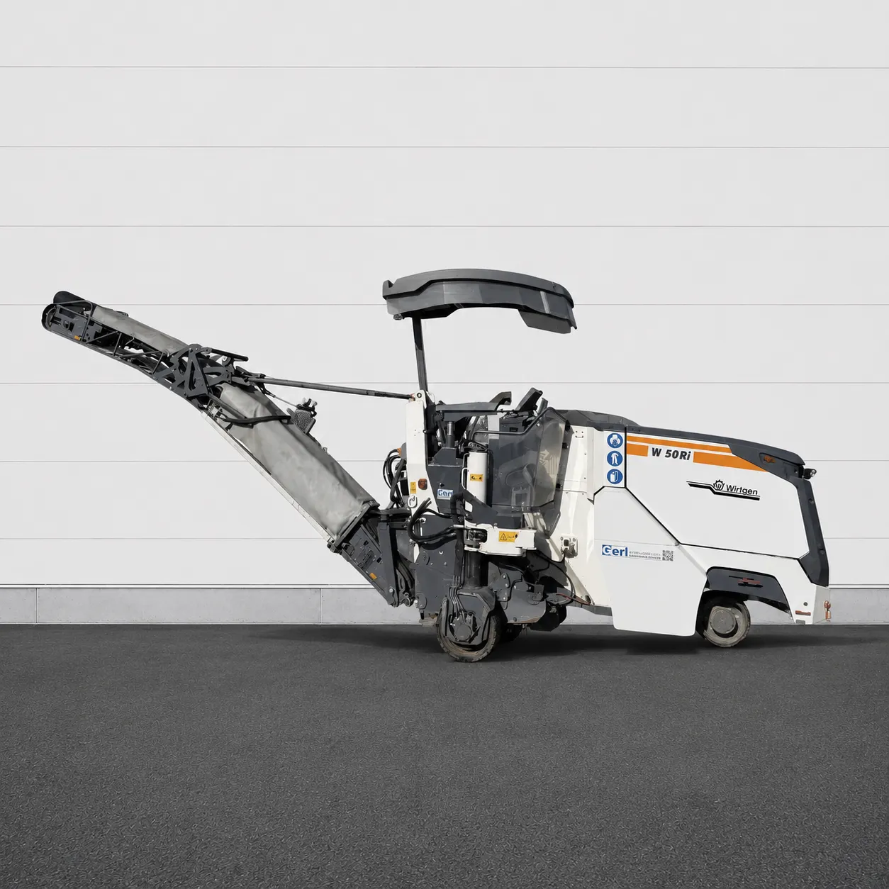 Wirtgen W 50 Ri cold milling machine side view with raised discharge conveyor